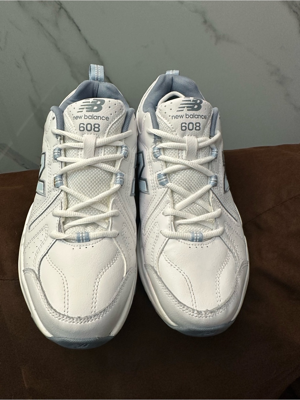 New Balance  Women’s White and Light Blue 608 Athletic Sneakers